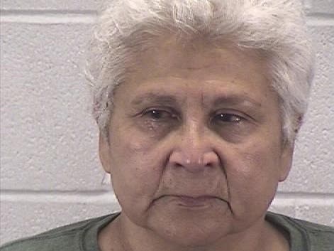 Abigail Arellano, 61, of Sandwich, faces a felony charge of aggravated battery with a firearm, according to Aurora police.
