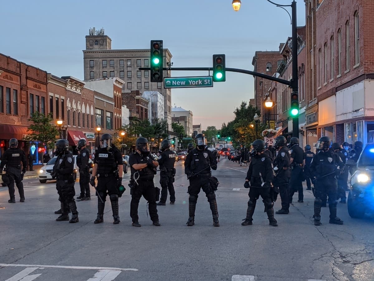 Aurora will remain under a curfew starting at 8:30 p.m. Monday. 