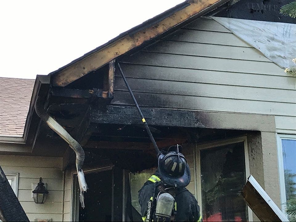 A grill fire caused about $150,000 in damage at a home on Aurora's west side, according to fire officials. 