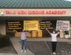 Tai Ji Men dizi hold posters to condemn the Taiwanese government’s human rights abuses against Tai Ji Men in front of the Tai Ji Men Qigong Academy in Cupertino, California on August 15, 2020. 
