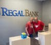 Stopping at the bank to learn about money.