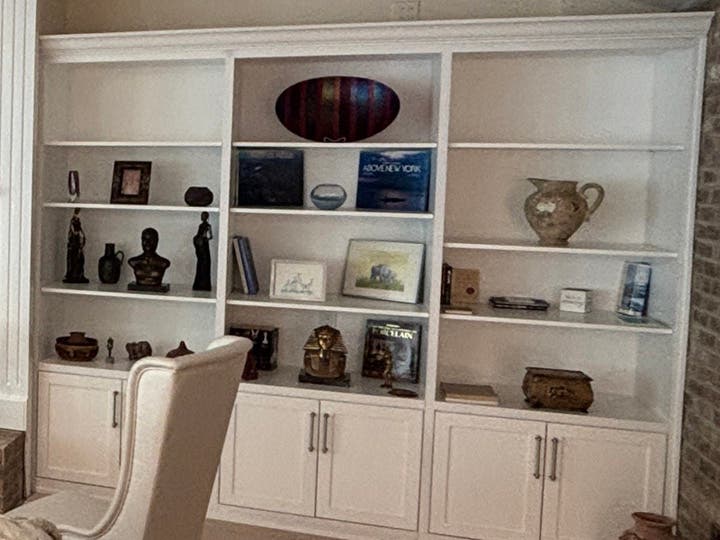 Bright White Shaker Built‑In Bookcase Adds Style and Storage to This Home