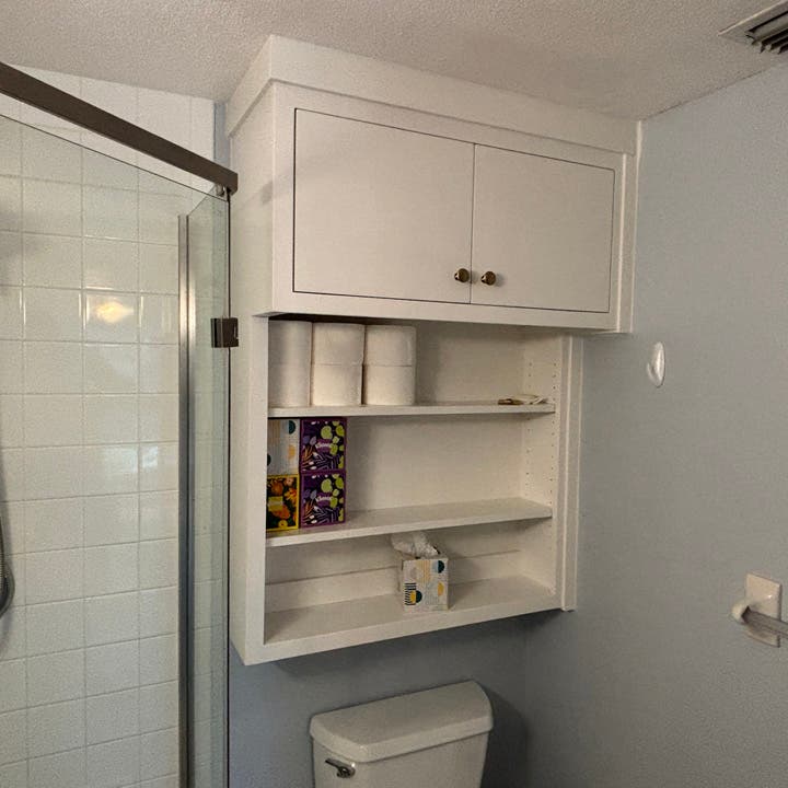 Custom Modern Over‑the‑Toilet Cabinet in Greek Villa Maple