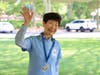 Adventure Campus counselor Bik Kit Tam loves teaching children how to knit and make origami. The $1,000 new employee bonus enticed her to apply last year.