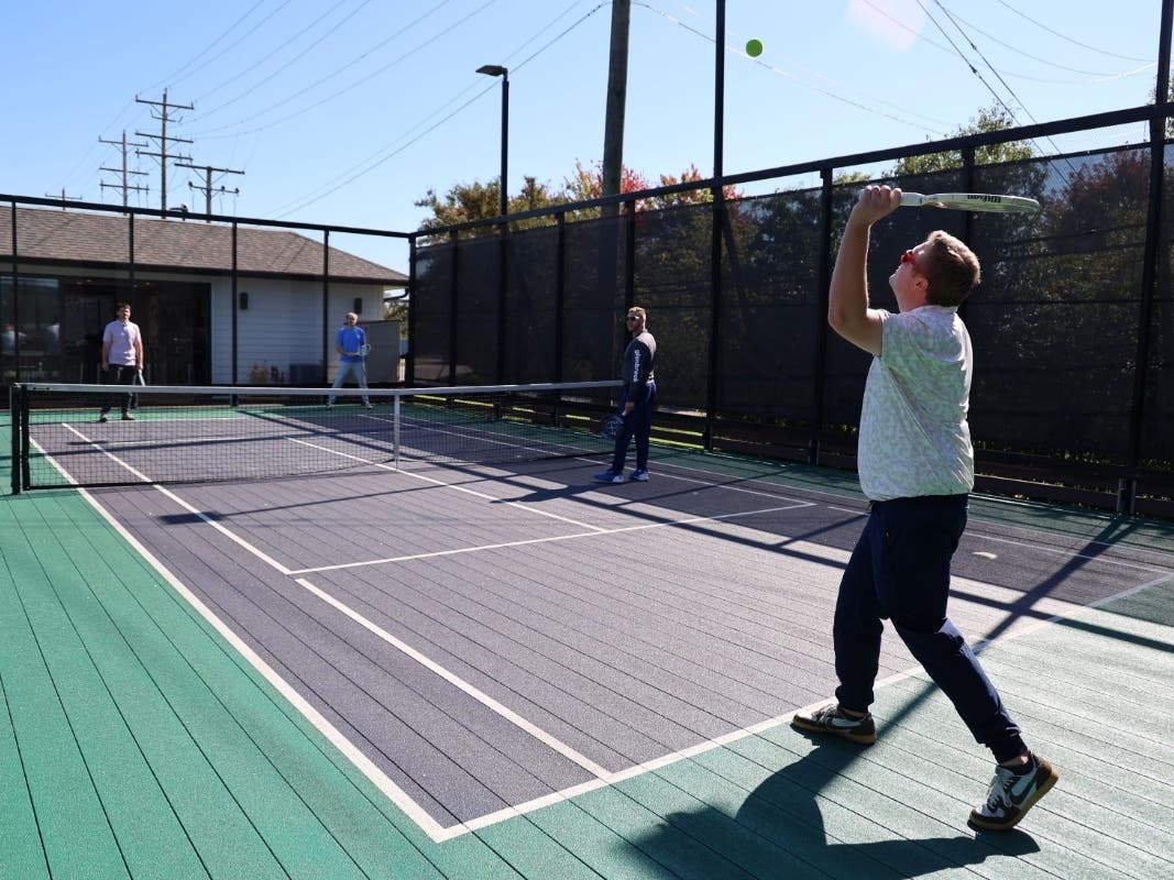 Northbrook Park District Recreation Supervisor Luke Denten, front, tried paddle for the first time earlier this week and gave it an enthusiastic thumbs up ahead of the Oct. 20 launch of classes held at Glenbrook Paddle Club