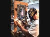 Mike Lust, Bearwood Design, Havre de Grace, MD works on sculpture.