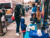 Passersby enjoyed free hot dogs, Philly Pretzels and cookies, DJ, and spun a wheel for prizes during Lou’s Jewelry & Pawn’s 100th anniversary celebration outside the 69th Street store in Upper Darby on Nov. 13, 2021.