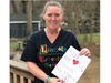 Dodi Yobs, Lincoln Elementary School first grade teacher, makes her students and parents a sign of support during the pandemic. 