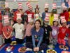 CJB First grade students celebrate their love of reading! 