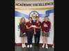 CJB Student Council Senior Ambassadors with the check for St. Francis Xavier Catholic School.   
