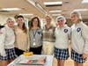8th grade students pictured with Sandwich Patrol Moderator, Tracy Cokinos.  