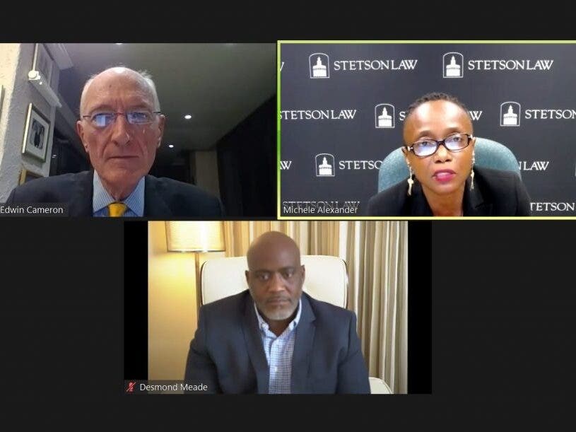 Desmond Meade, bottom row, received the Wm. Reece Smith, Jr. Public Service Award on Feb. 22. Pictured, top row from left, keynote speaker Justice Edwin Cameron and Dean Michèle Alexandre.