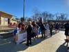 Girl Scout Troop Number 572 served hot chocolate the Trinity Falls residents