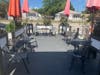 Tables are placed within six feet of each other at Southside Coffee Brew Bar's outside seating location. 