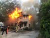 Firefighters battle a Winter Haven apartment fire that started in an upstairs unit and spread to the rest of the building on the evening of May 13. 