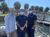 Petty Officers Velez and Hengstler following Center for Disease Control Guidelines along with Patch reporter Skyla Luckey. 
