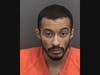 Jawuan Malik Kin, 21, was arrested and charged with felon in possession of a firearm, carrying a concealed firearm and other charges.