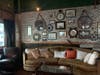 A sitting area with a Victorian theme inside the speakeasy. 