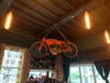 A 1911 Flying Merkle motorcycle hangs above the bar area. The Flying Merkle at Club 201 is one of four left in the world, owner Susan Aversa said.