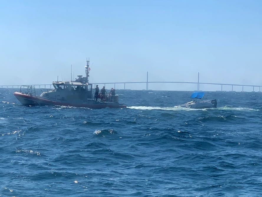 Six people were rescued by the Coast Guard near the Skyway Bridge on Saturday after their boat overturned, officials said.