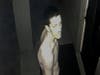 Detectives are searching for a man who was seen naked stealing mail on a surveillance camera at a business in downtown St. Petersburg. 