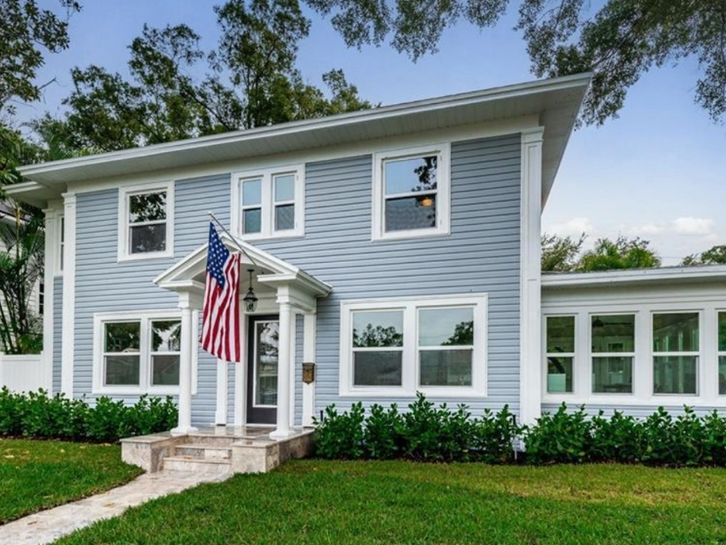Enjoy a good book in the sunroom of this St. Petersburg charm. 
