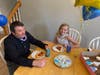 Father and daughter enjoy special cookies.
