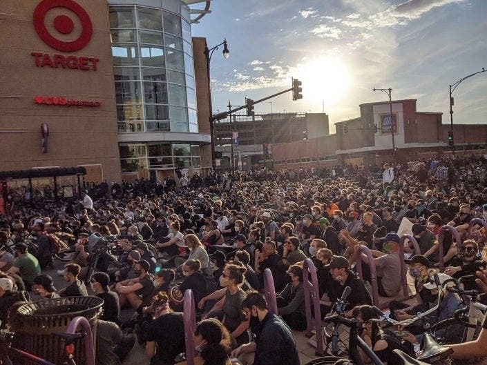 Thousands protest Monday in the Uptown neighborhood of Chicago.