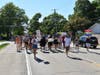 The protesters march toward Northbrook Village Hall. 