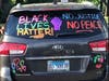 Cars parade around Arlington Heights Friday night for a Black Lives Matter/Juneteenth protest.