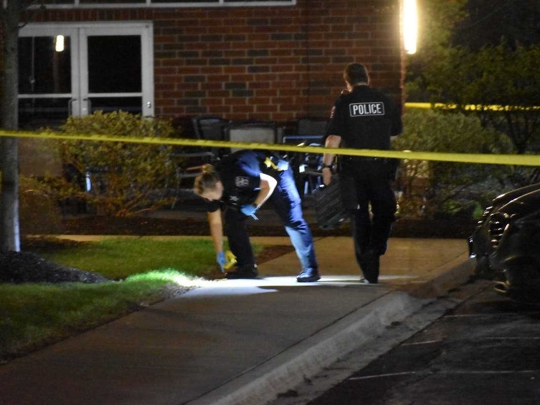 Northbrook police investigate the scene Friday morning in the parking lot of the Sheraton Chicago Northbrook Hotel on Willow Road.