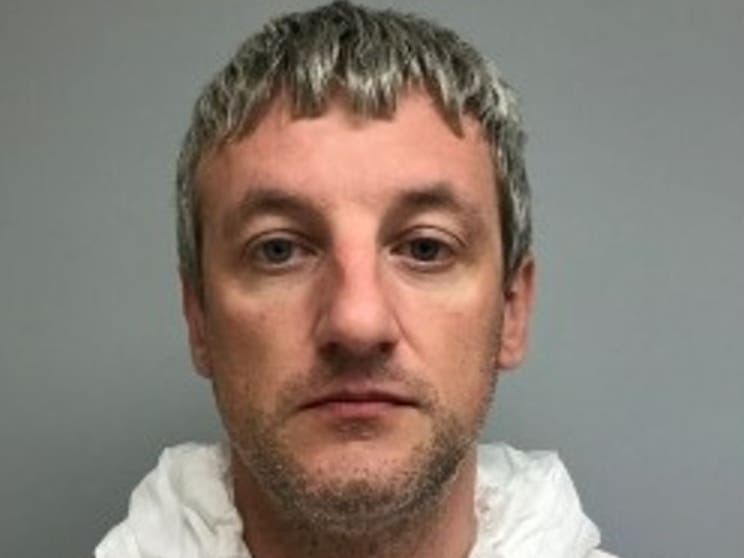 Volodymyr Dragan held one Illinois State Trooper at gunpoint in an earlier 2019 incident and shot another ISP officer during an attempted apprehension at his residence. 