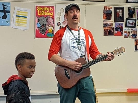Jeremy Bartunek leads a music class at Greenbriar School in Northbrook.