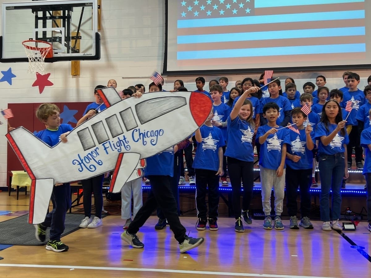 Wescott fourth-graders sing “Honor Flight,” an original song by music teacher Quentin Coaxum, Thursday during their annual Veterans Day concert.
