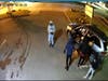 The group arrived at the used car dealership at around 3 a.m. and are seen in this surveillance camera image. 