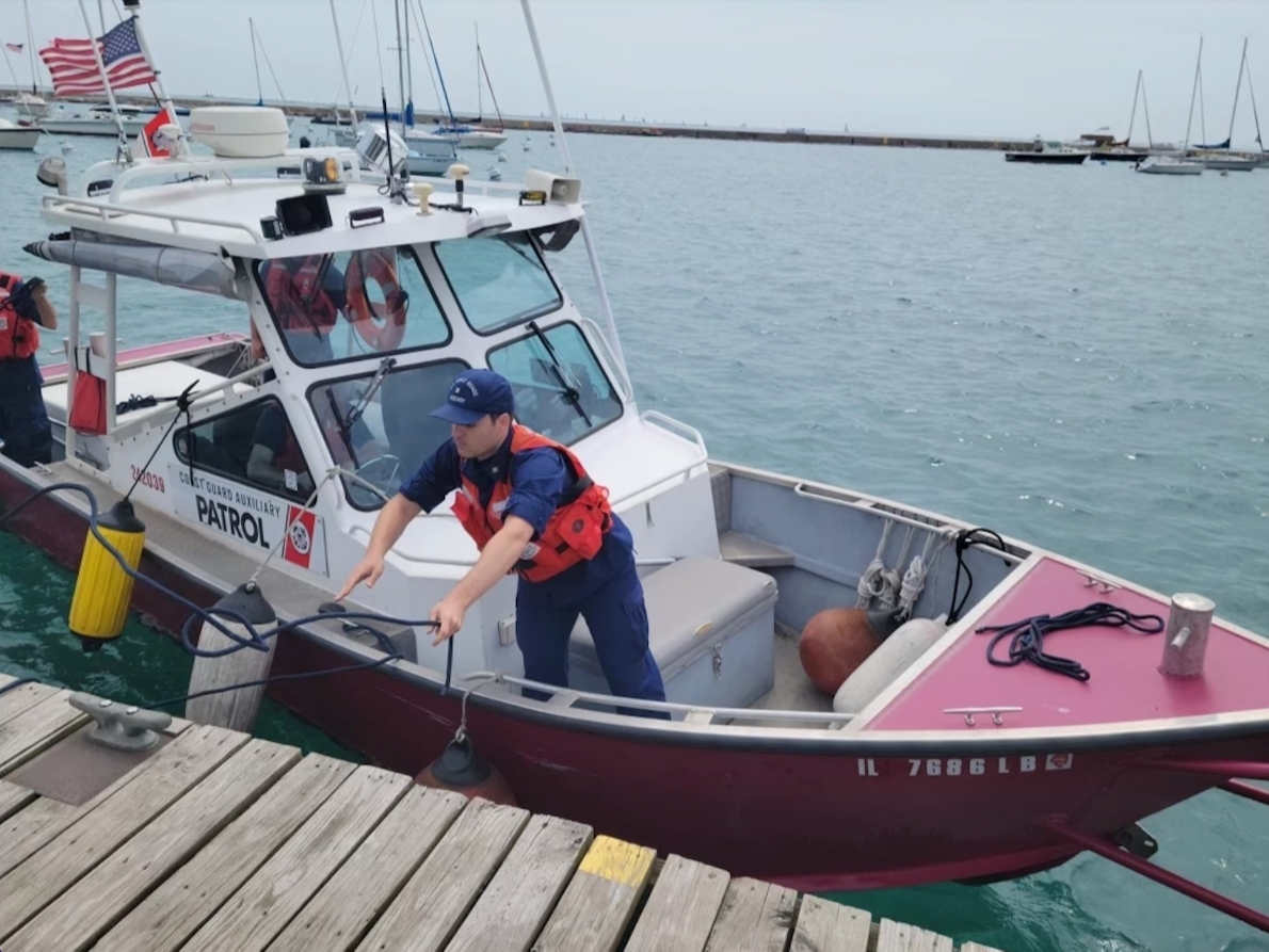 John Saran, of Northbrook, works on a rescue boat on Lake Michigan. 