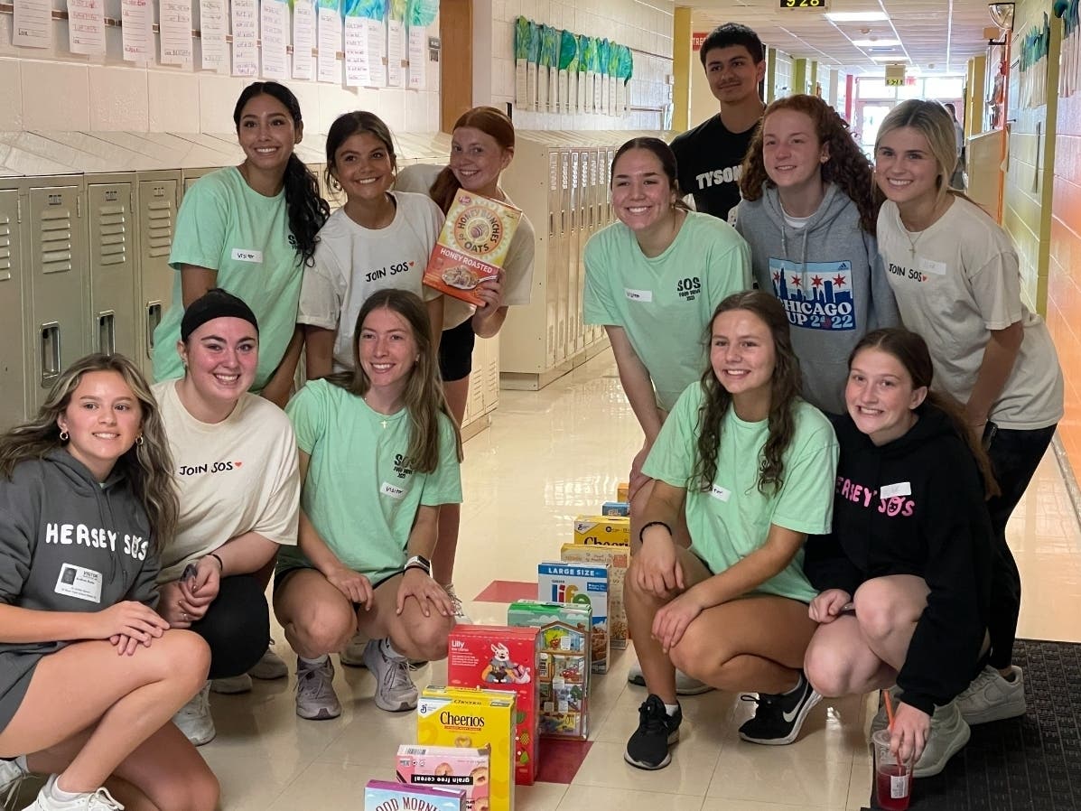 Students from John Hersey High School meet up at Indian Grove. 