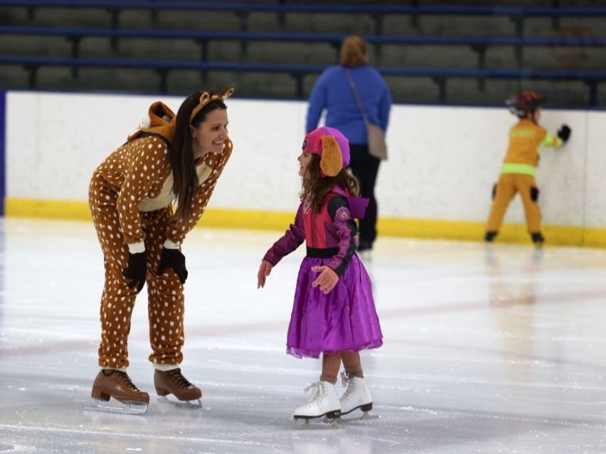 Kids and adults can wear their scariest Halloween costumes to glide on the ice. 