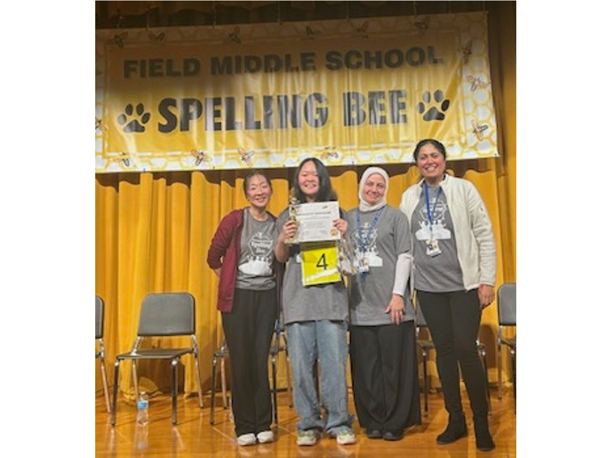 Summer Kang celebrates her win on Jan. 16 at Field Middle School. 