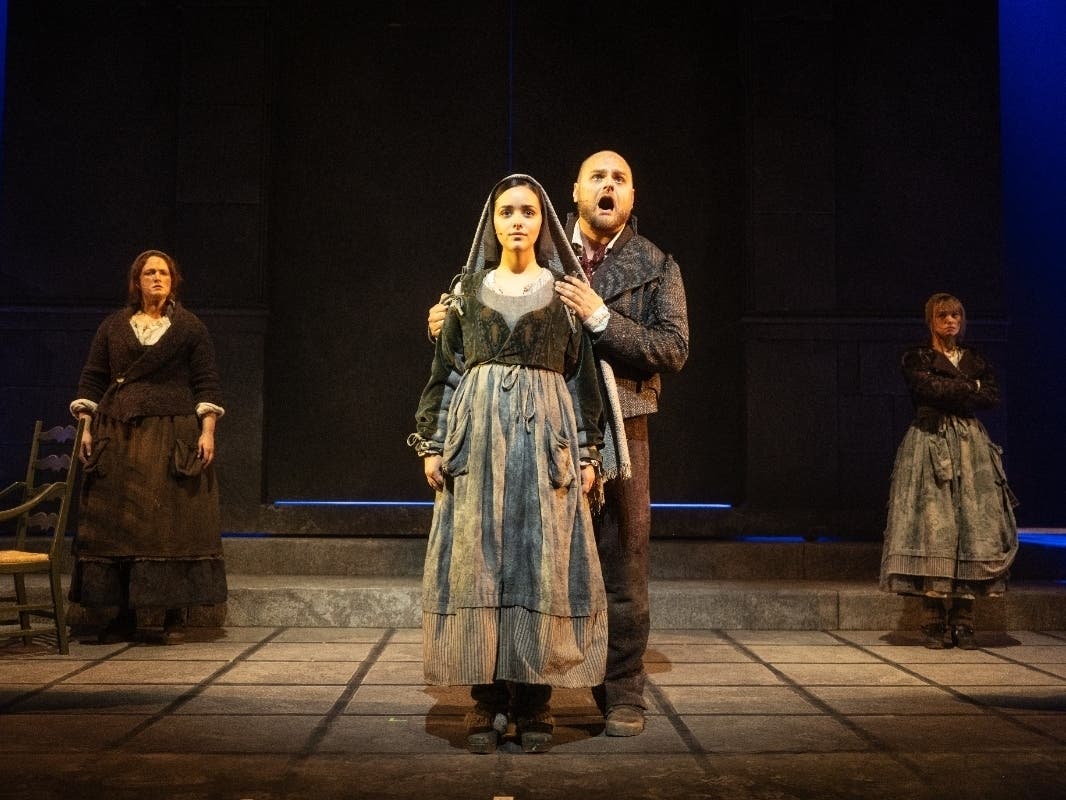 Bernadette Soubirous, played by French singer and actress Eyma Scharen, is joined by her father, played by Jérémie Roy, in "Bernadette, The Musical."