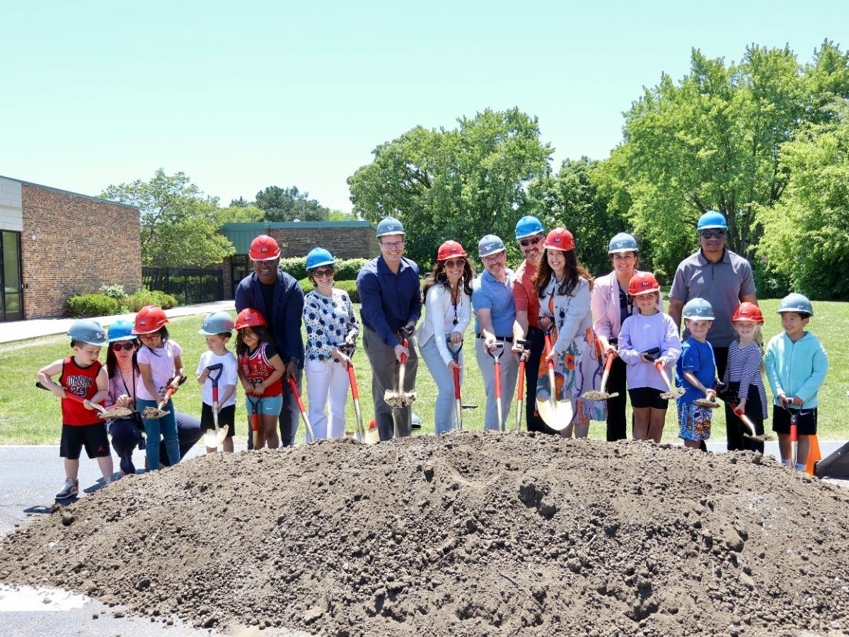 District 27 administrators, staff, and Board of Education members join Hickory Point Elementary School students on Tuesday for a construction groundbreaking ceremony.