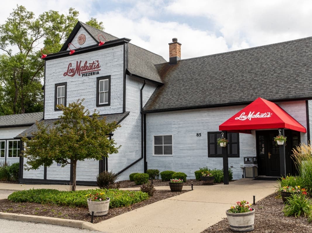 The exterior of the building was repainted from red to white as part of the renovation.