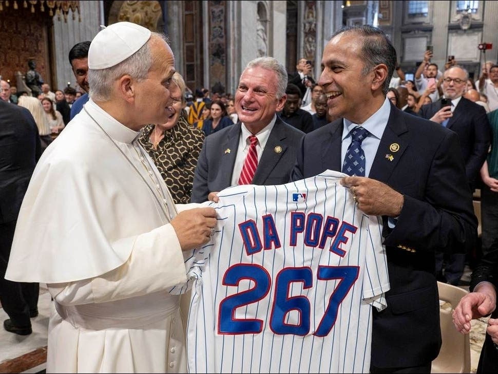 U.S. Rep. Raja Krishnamoorthi (IL-8th District) presents a Chicago Cubs jersey to Pope Leo XIV last week at the Vatican.