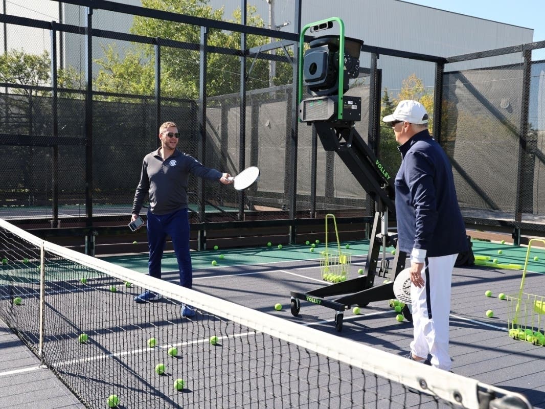 The club's four outdoor courts sit on an elevated deck with a heating system that prevents snow accumulation.