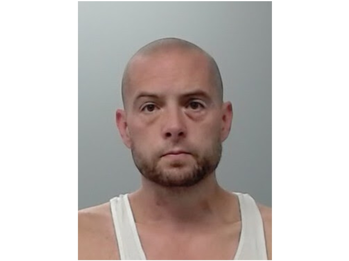 Matthew R. Kindle repeatedly approached the group at a playground while reaching toward his waistband as though he had a weapon, according to police.