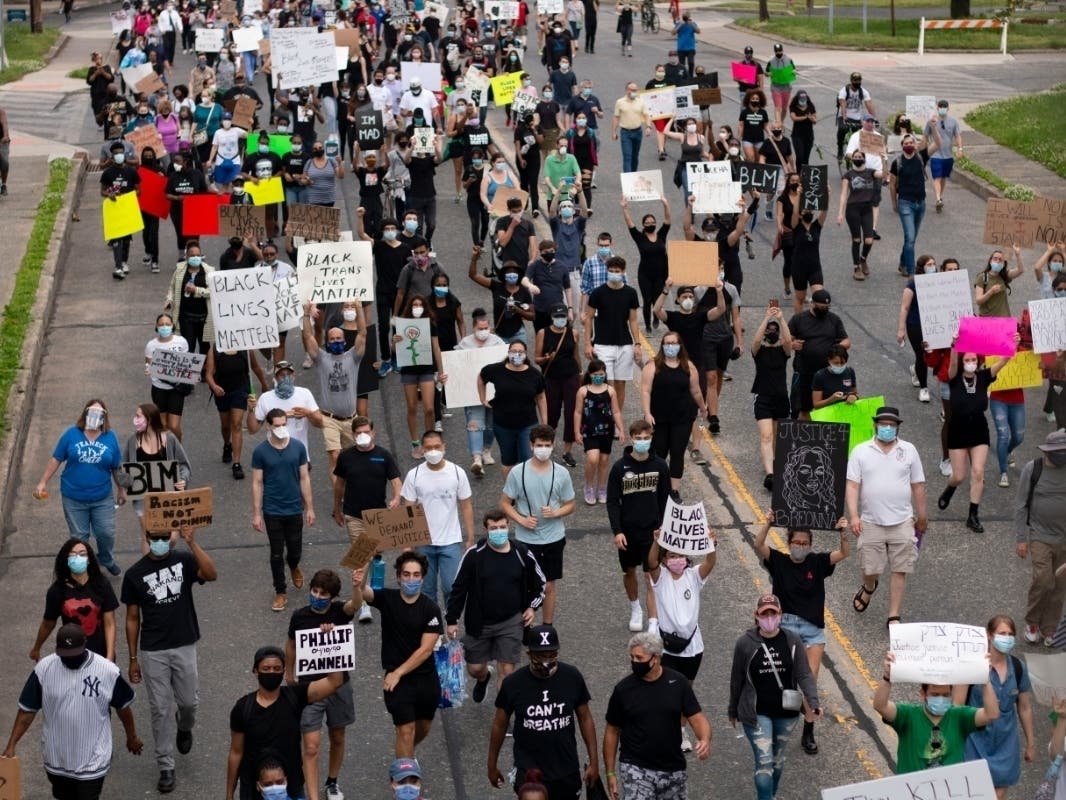 Protesters march through Teaneck on Friday, June 5, in protest of the death of George Floyd.