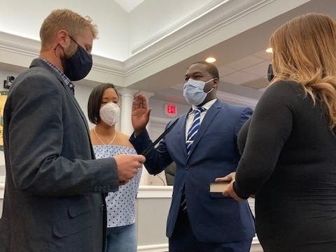 Gilot Castor is sworn in during a Tuesday ceremony.