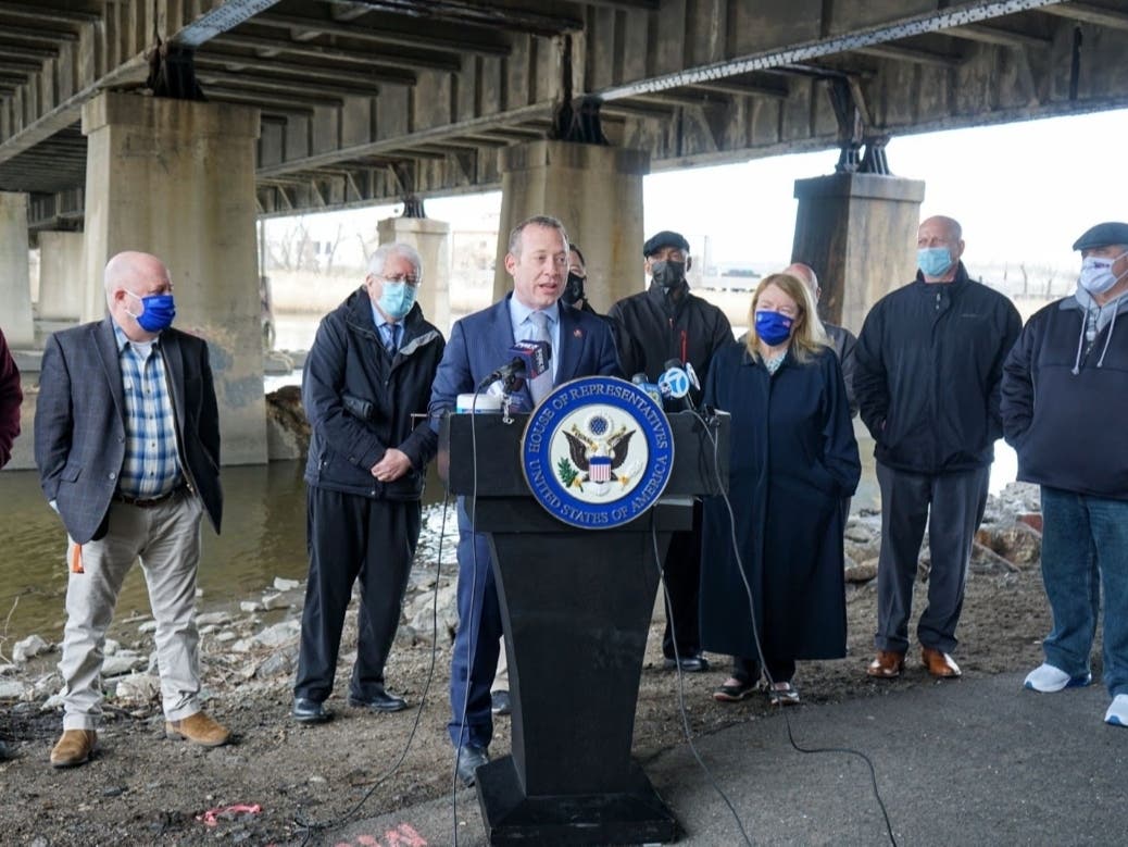 Rep. Josh Gottheimer Gottheimer joined local labor leaders and officials to highlight infrastructure investment needs in North Jersey — beneath a bridge in Teaneck deemed structurally deficient.