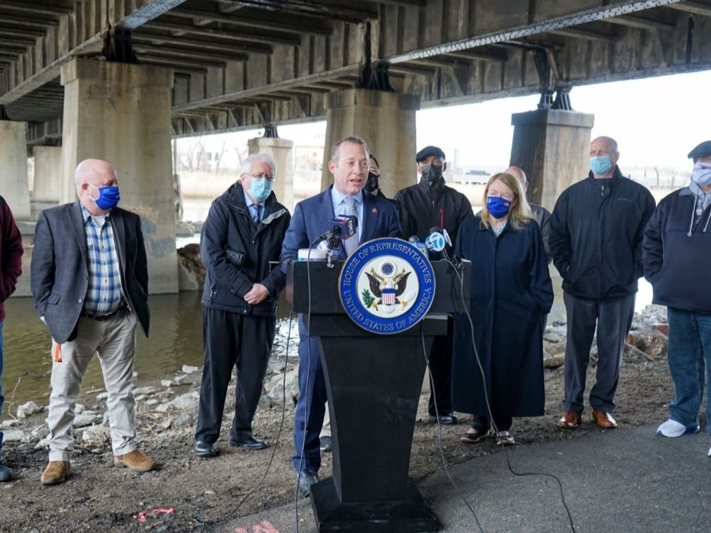 Rep. Josh Gottheimer and other state and county leaders gathered under the Route 4, Hackensack River bridge in Teaneck recently.