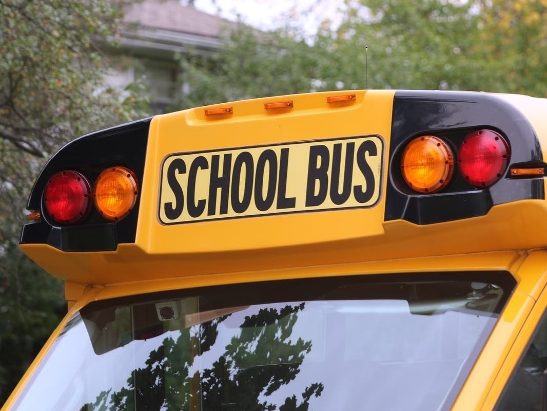 The school bus was heavily damaged in the accident, officials said.